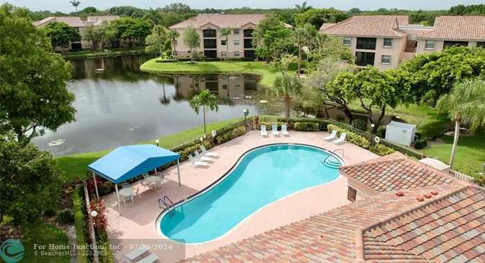 photo 1: 4151 Coral Tree Cir Unit 258, Coconut Creek FL 33073