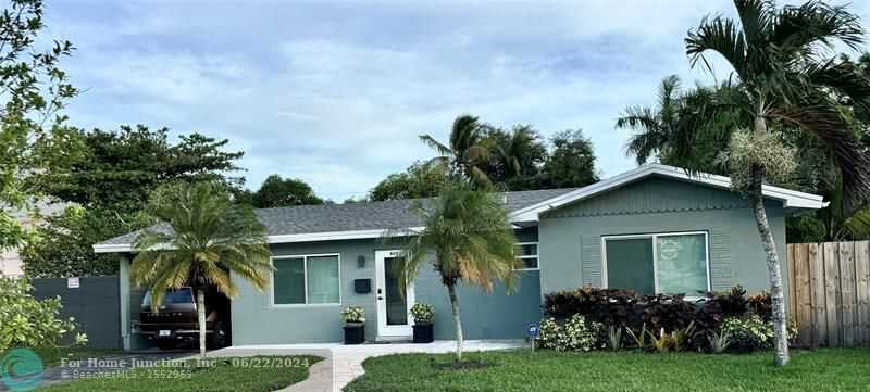 photo 1: 633 NW 38th St, Oakland Park FL 33309