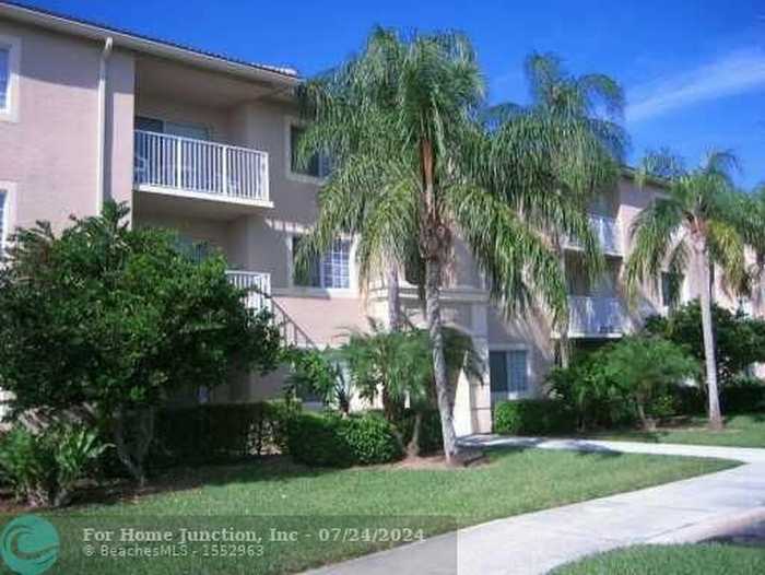 photo 1: 5055 Wiles Rd Unit 103, Coconut Creek FL 33073