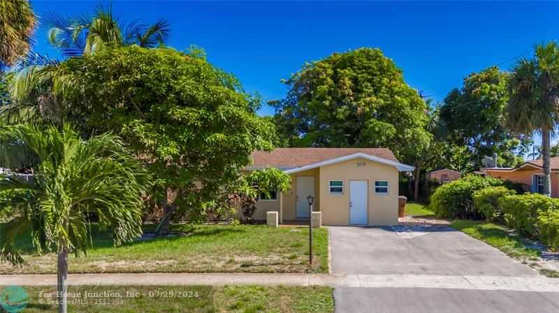 photo 2: 3570 NW 29th St, Lauderdale Lakes FL 33311