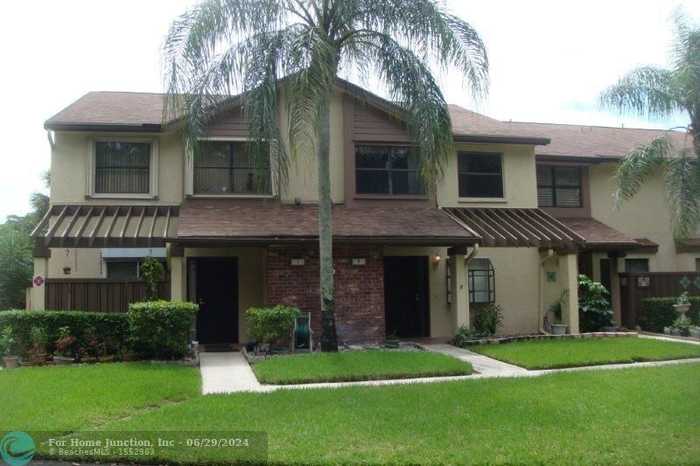 photo 1: 3963 Cocoplum Cir Unit B, Pompano Beach FL 33063