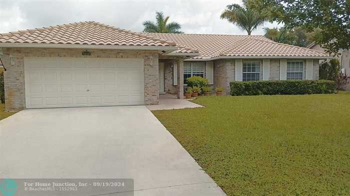 photo 1: 9712 NW 46th Mnr, Coral Springs FL 33076