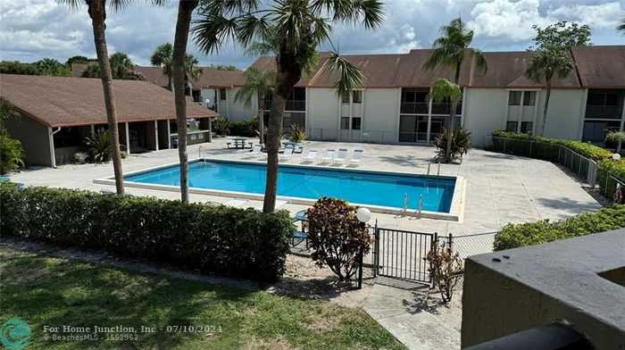 photo 1: 5498 Courtyard Dr Unit 5498, Margate FL 33063