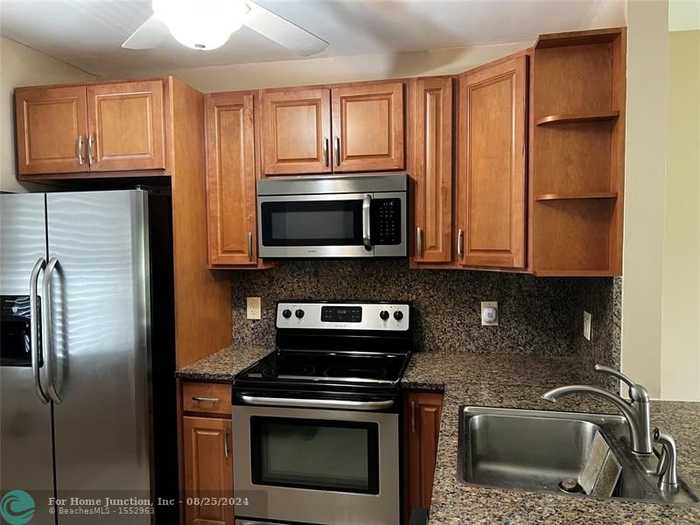 photo 1: 551 NW 80th Ter Unit 208, Margate FL 33063