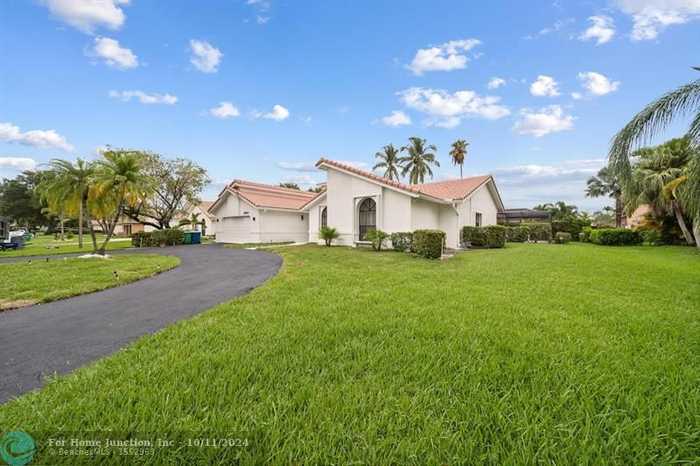 photo 2: 8640 NW 53rd Ct, Coral Springs FL 33067