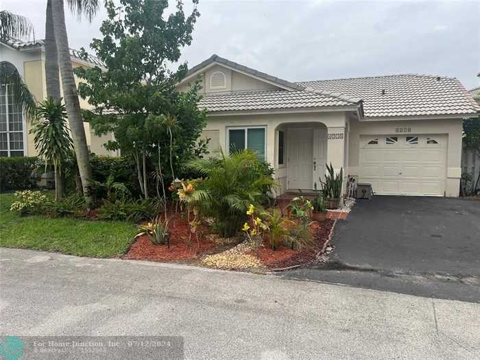 photo 2: 4270 NW 55th Dr, Coconut Creek FL 33073