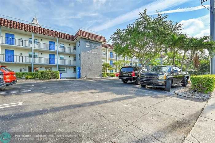 photo 1: 8605 W Sample Rd Unit 209, Coral Springs FL 33065