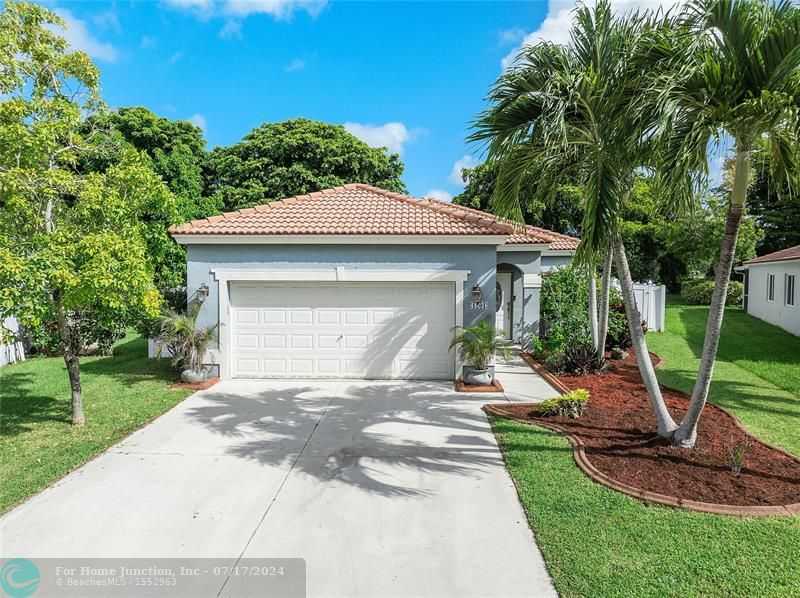 photo 1: 1201 SW 46th Way, Deerfield Beach FL 33442