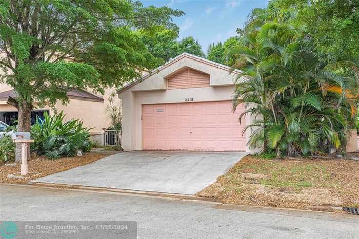 photo 1: 2231 NW 34th Ter, Coconut Creek FL 33066