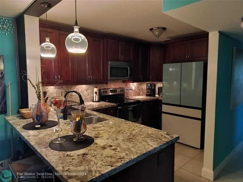 photo 1: 3007 N Oakland Forest Dr Unit 107, Oakland Park FL 33309