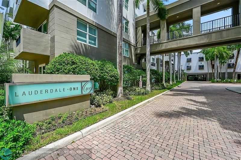 photo 1: 2401 NE 65th St Unit 404, Fort Lauderdale FL 33308