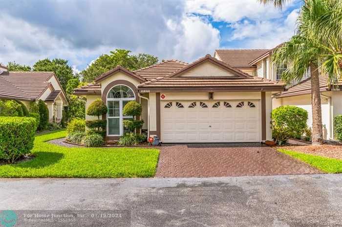 photo 1: 11644 NW 19th Dr, Coral Springs FL 33071