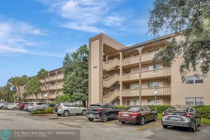 photo 1: 1705 Andros Isle Unit M4, Coconut Creek FL 33066