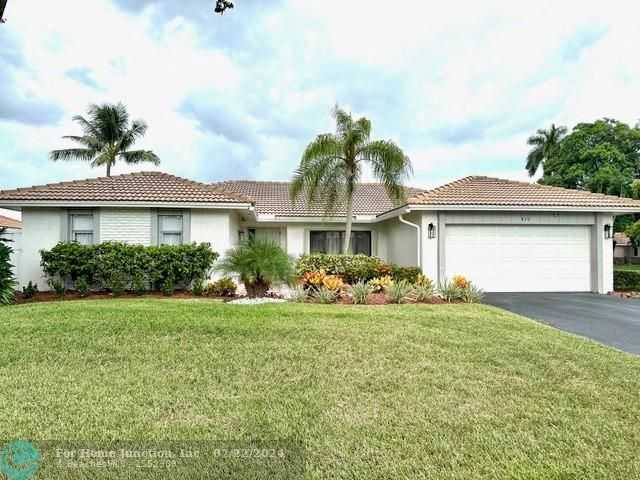 photo 1: 615 NW 100th Ln, Coral Springs FL 33071