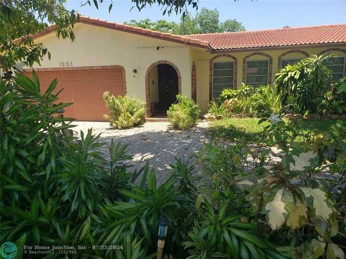 photo 1: 1251 NW 85th Ter, Coral Springs FL 33071