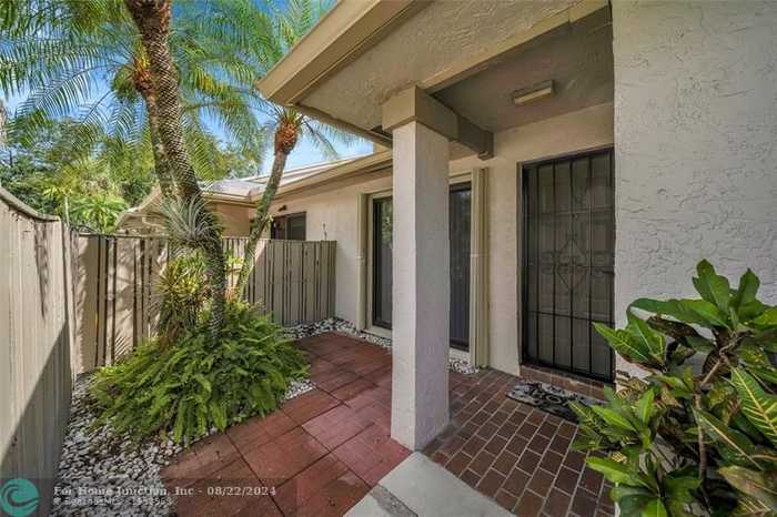 photo 1: 3777 NW 35th St Unit 3777, Pompano Beach FL 33066