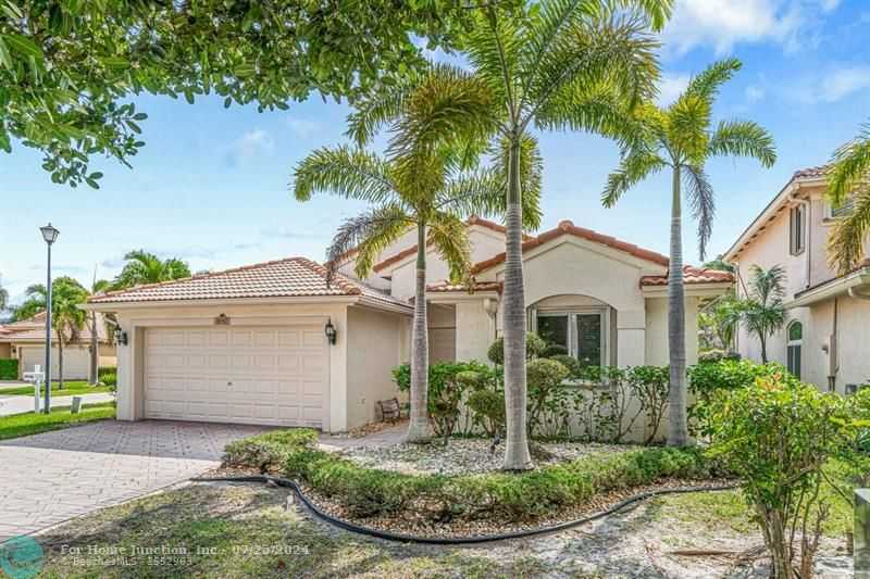 photo 1: 4692 Saint Simon Dr, Coconut Creek FL 33073