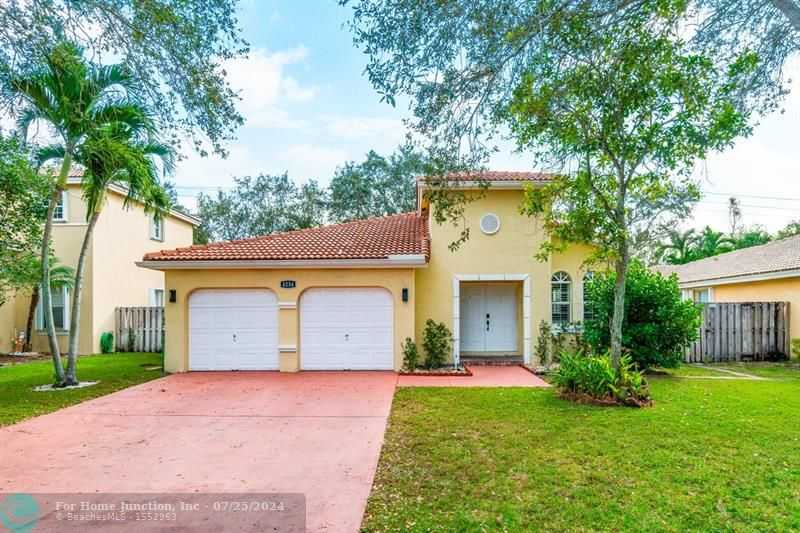 photo 2: 4234 NW 38th Dr, Coconut Creek FL 33073