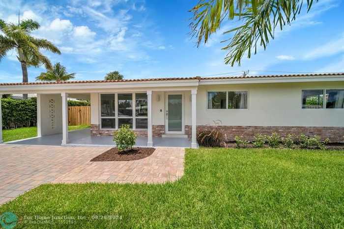 photo 1: 2051 NE 60th St, Fort Lauderdale FL 33308