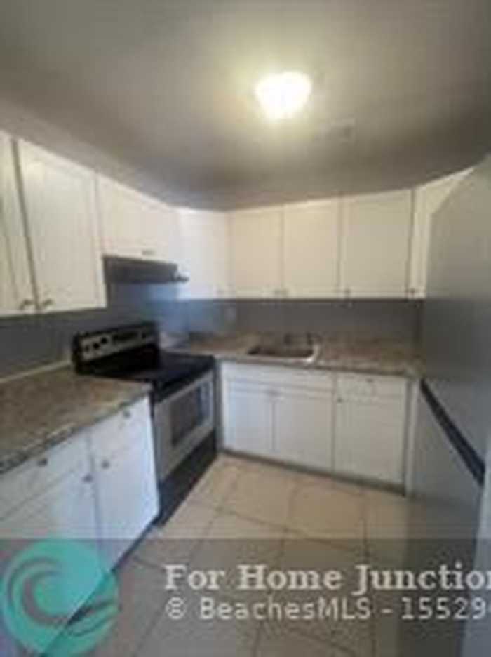 photo 1: 202 NW 32nd Ct Unit 206, Pompano Beach FL 33064