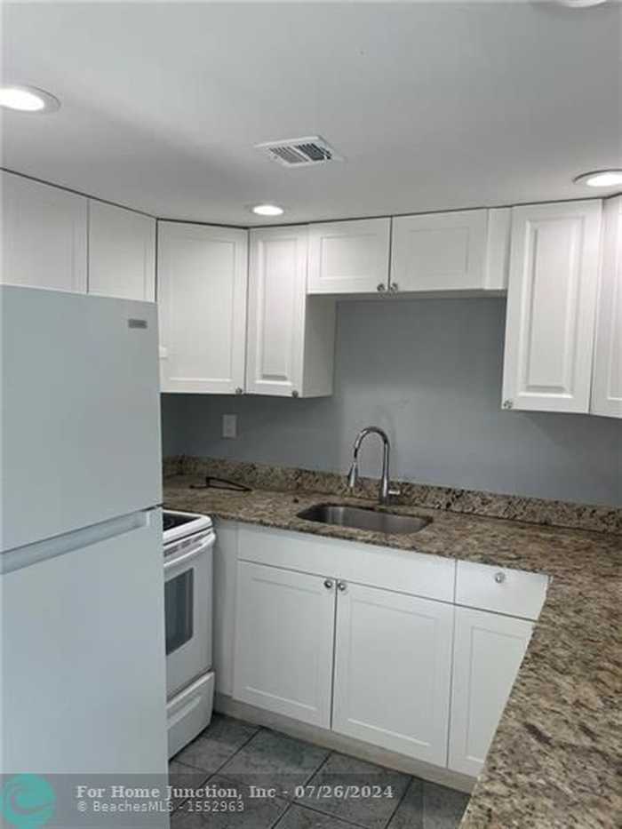 photo 1: 403 NW 32nd Ct Unit 211, Pompano Beach FL 33064