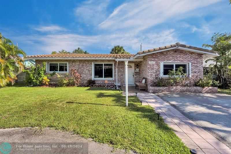 photo 1: 2024 NW 39th St, Oakland Park FL 33309