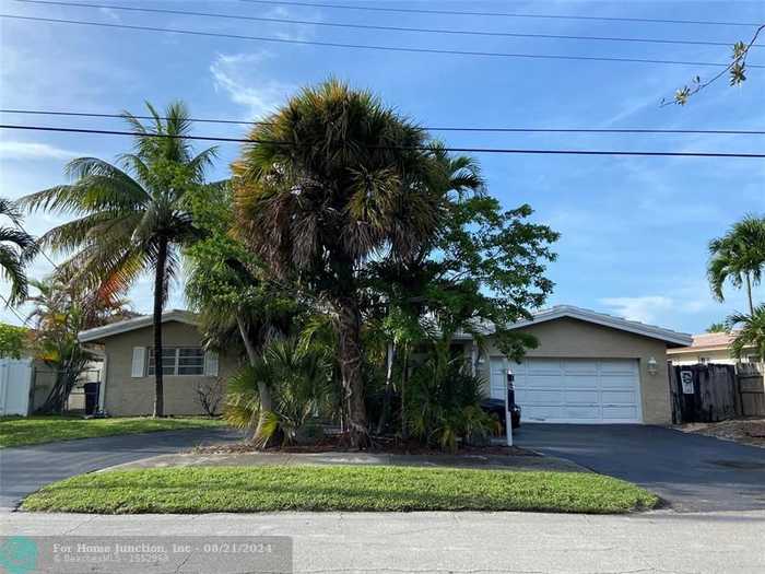 photo 1: 1425 NE 53rd St, Fort Lauderdale FL 33334