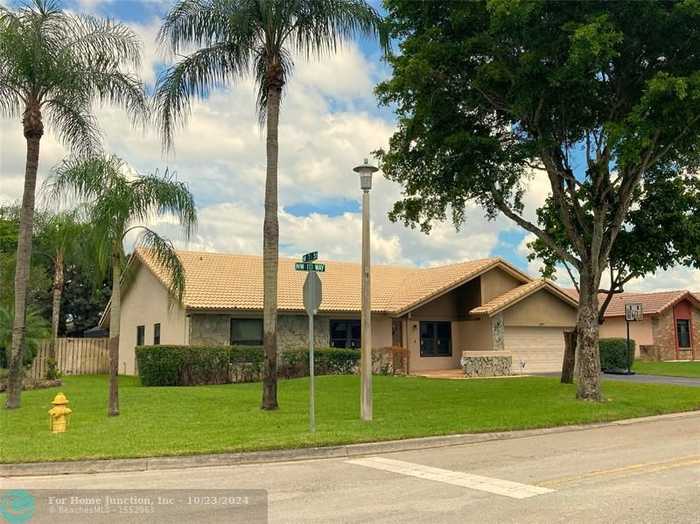 photo 1: 691 NW 111th Way, Coral Springs FL 33071