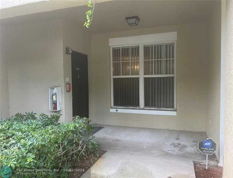 photo 1: 5880 W Sample Rd Unit 104, Coral Springs FL 33067