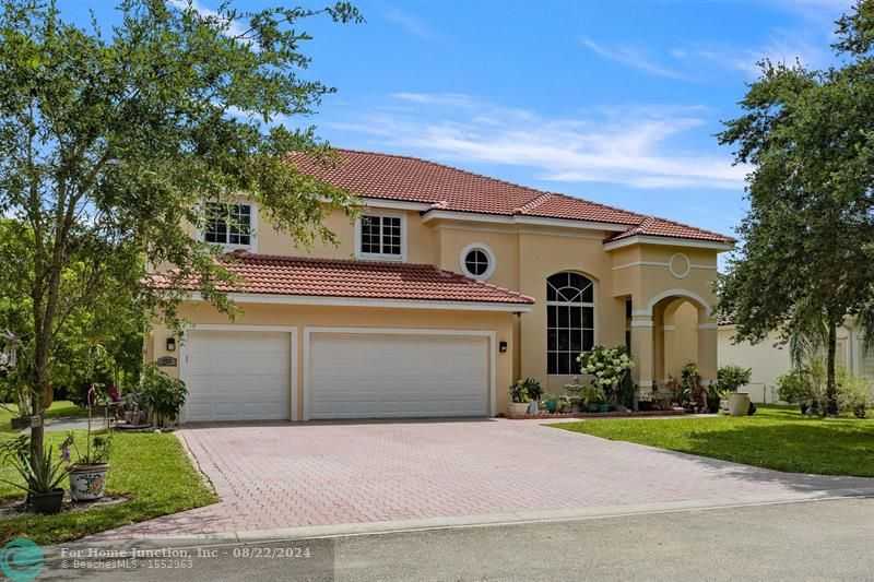 photo 1: 10214 NW 54th Pl, Coral Springs FL 33076