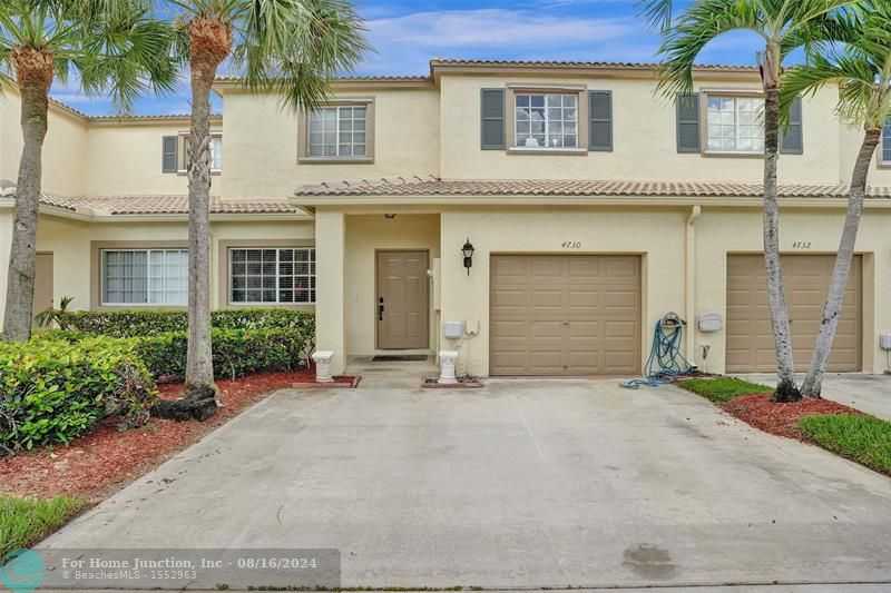 photo 1: 4730 Lago Vista Dr, Coconut Creek FL 33073