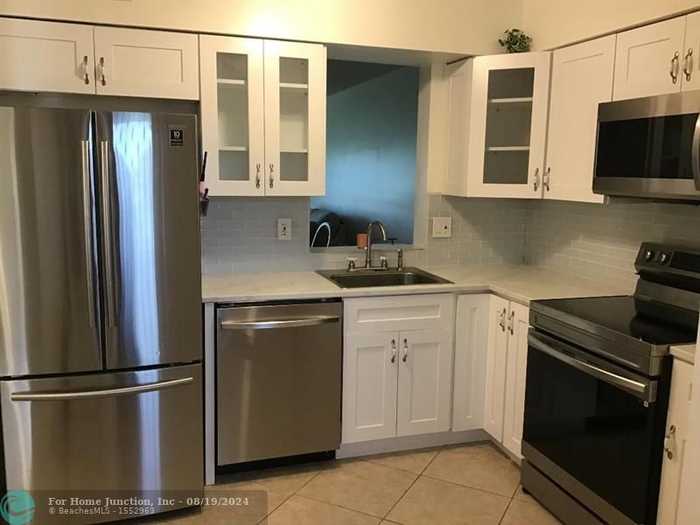 photo 1: 7561 NW 1st St Unit 301, Margate FL 33063