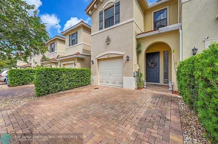 photo 1: 1035 NW 33rd Manor, Pompano Beach FL 33064