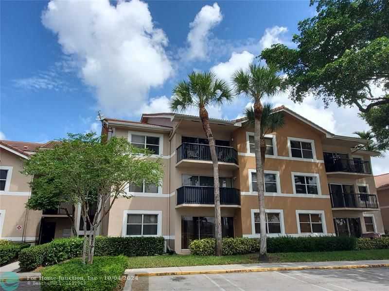 photo 3: 8955 Wiles Rd Unit 104, Coral Springs FL 33067