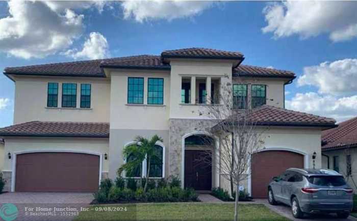 photo 1: 8925 Parkland Bay Dr, Parkland FL 33076