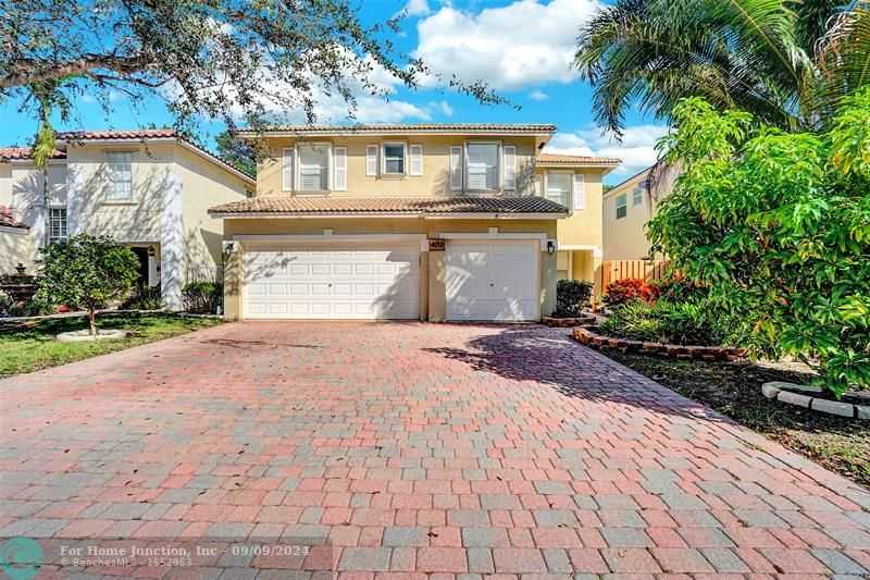 photo 1: 4013 NW 63rd St, Coconut Creek FL 33073