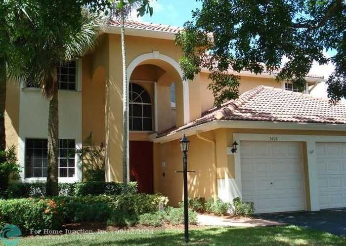 photo 1: 5408 NW 109th Ln, Coral Springs FL 33076