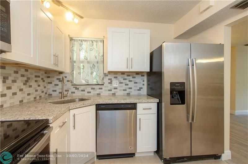 photo 1: 3531 Cocoplum Cir Unit 3466, Pompano Beach FL 33063