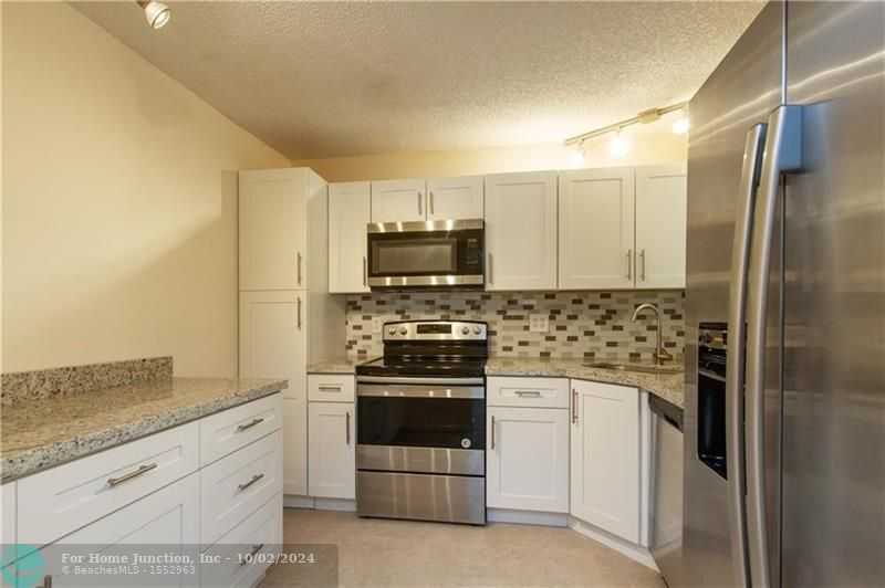 photo 3: 3531 Cocoplum Cir Unit 3466, Pompano Beach FL 33063