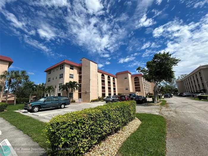 photo 1: 3251 Holiday Springs Blvd Unit 408, Margate FL 33063