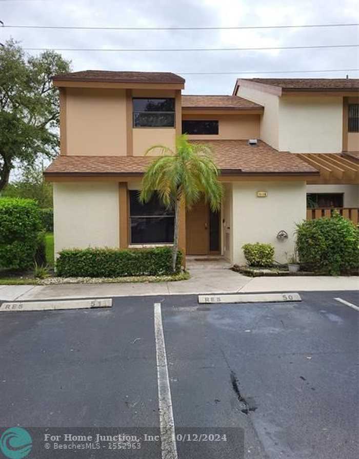 photo 1: 4698 NW 30th St Unit 1, Coconut Creek FL 33063