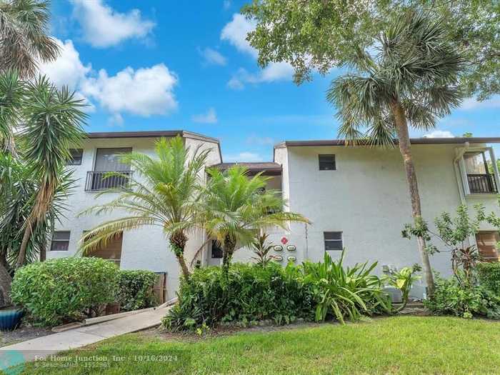 photo 1: 3119 Cocoplum Cir Unit 33105, Coconut Creek FL 33063