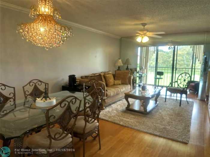 photo 1: 7847 Golf Circle Dr Unit 311, Margate FL 33063