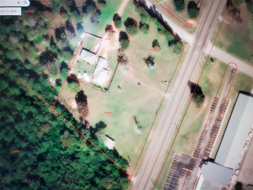 photo 1: 14005 State Hwy 150, Coldspring TX 77331