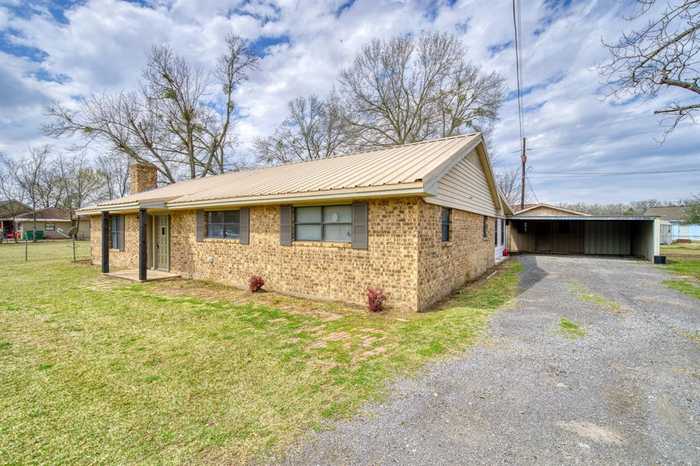 photo 1: 203 S Tammye Lane, Madisonville TX 77864