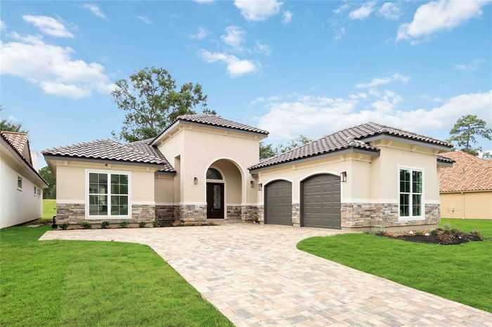 photo 1: 16015 Bridges Fairway Lane, Houston TX 77068