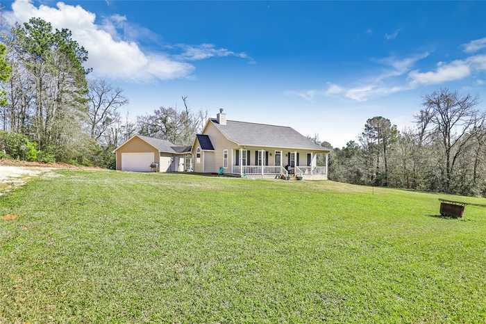 photo 1: 440 Town Creek Road, Coldspring TX 77331