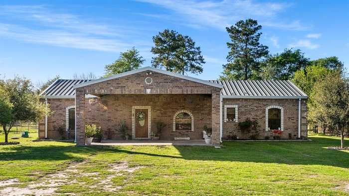 photo 1: 9529 N Walker Road, Cleveland TX 77328