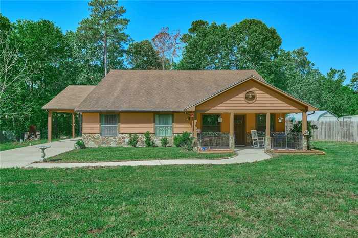 photo 1: 47 Stagecoach Road, Coldspring TX 77331