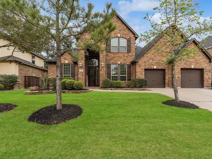 photo 1: 34106 Mill Creek Way, Pinehurst TX 77362